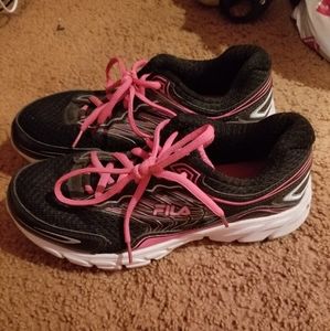 Pink and black FILA shoes